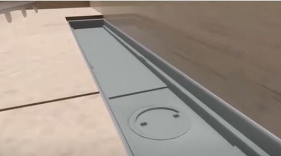 Acessório Fecha Ralo instalado em um equipamento linear